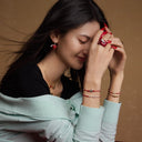 星光马蹄扣红绳手链