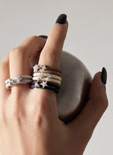 <em>RINGS</em>